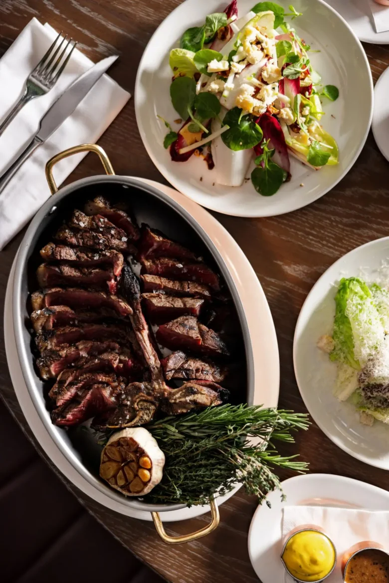 Côte de Boeuf sharing platter with side salads and béarnaise sauce at Marco Pierre White Steakhouse & Grill Dublin 2